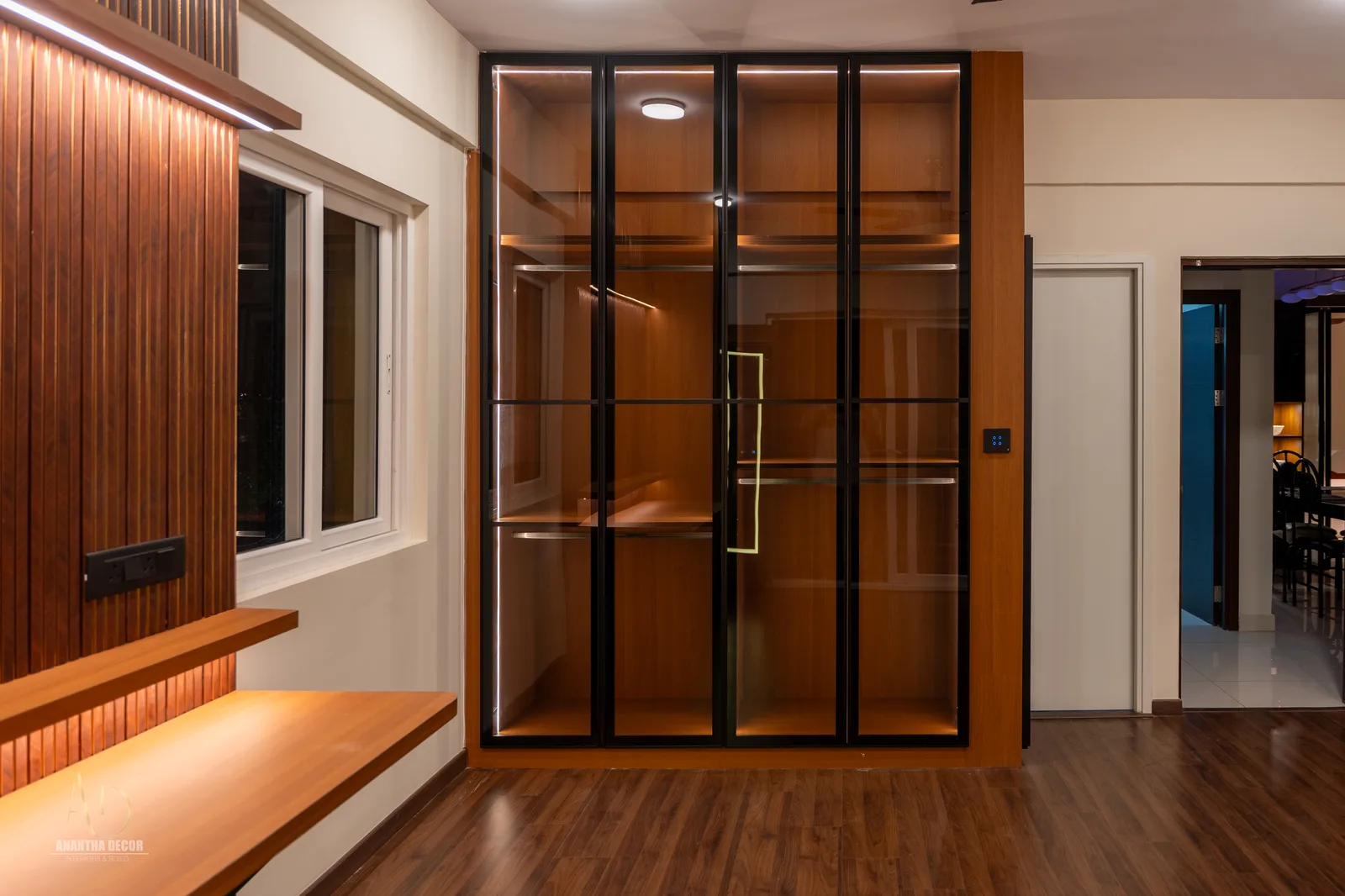 Master bedroom wardrobe with fluted glass sliding doors