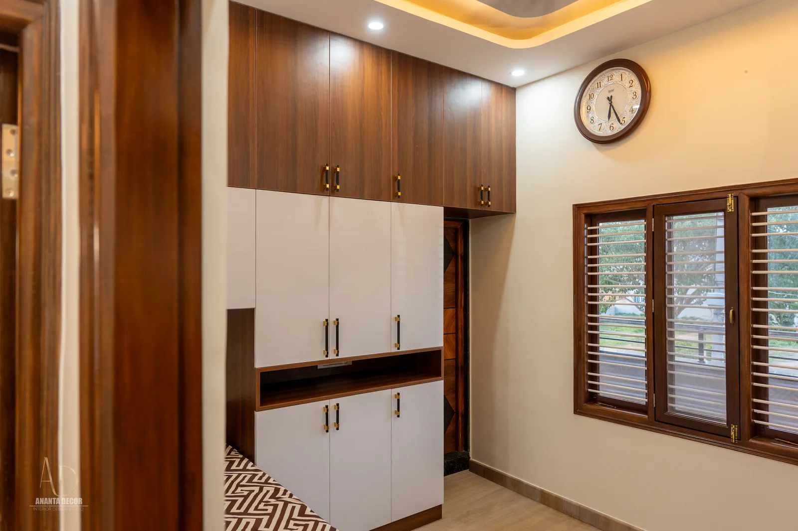 Dining-to-kitchen transition overlooking the pooja portal