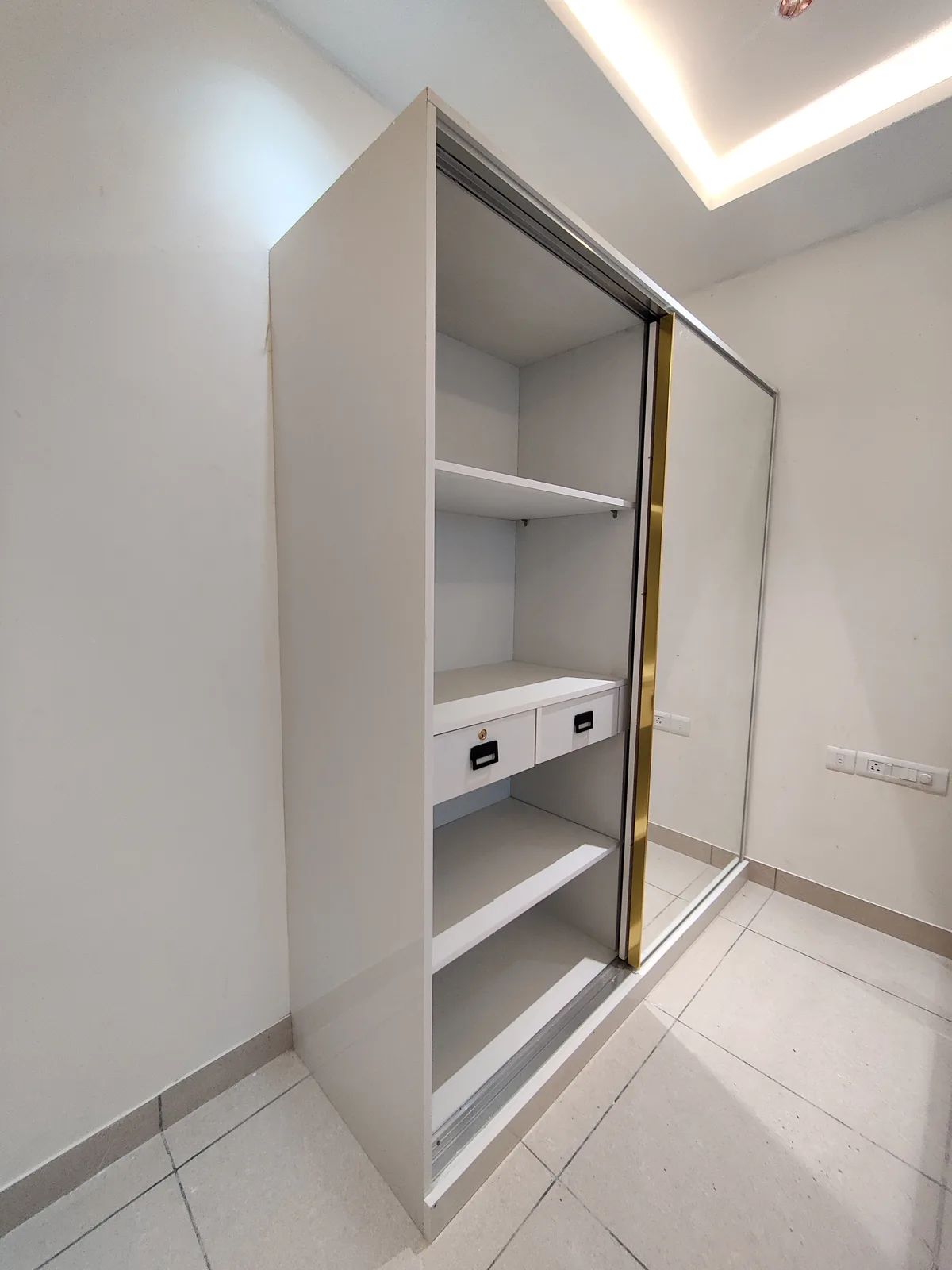 Custom wardrobe interior layout with pull-out drawers